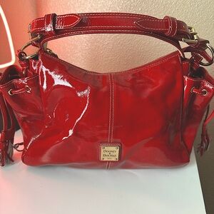 Dooney & Bourke Purse with matching wallet. Red Patent Leather. Pre-owned.